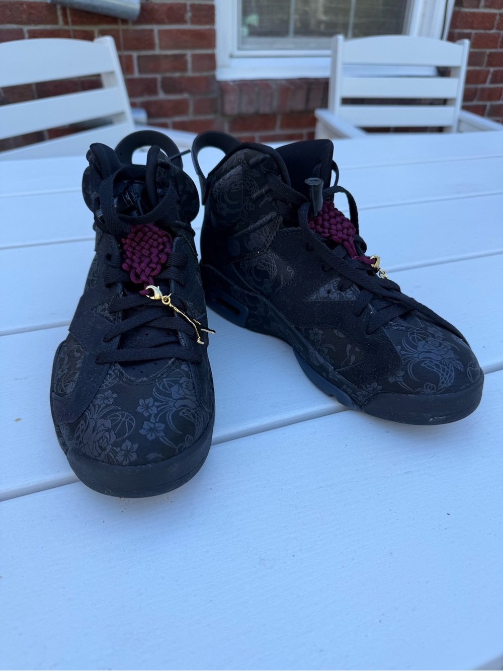 Jordan Women's Black High-Top Sneakers with Burgundy Accents